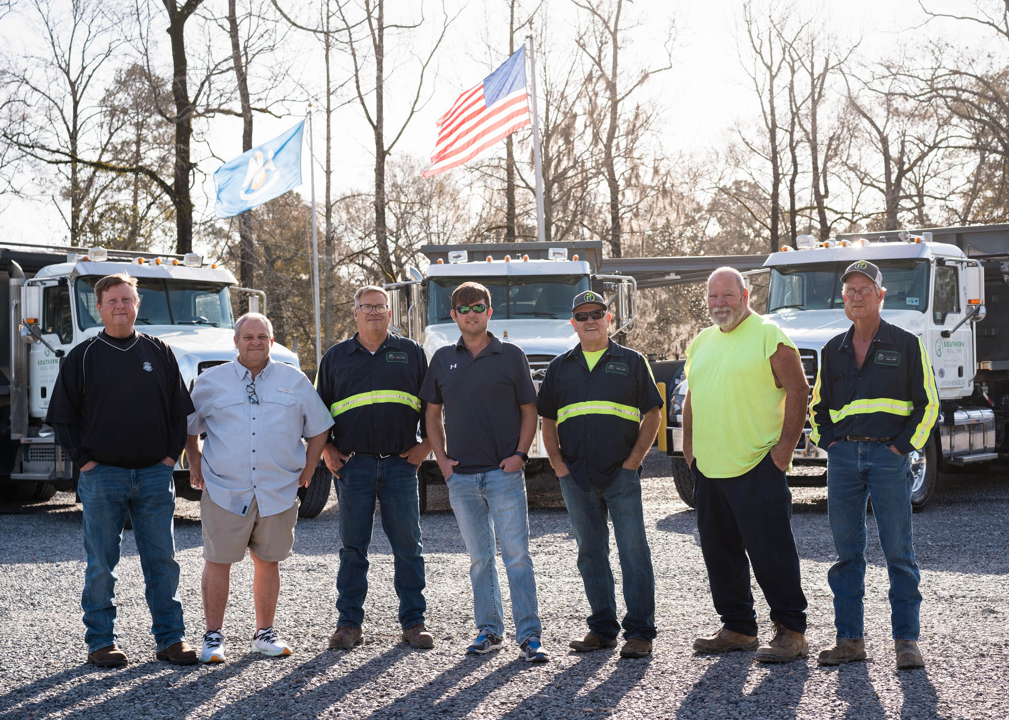 Southern Roll Off team photo in front of their trucks
