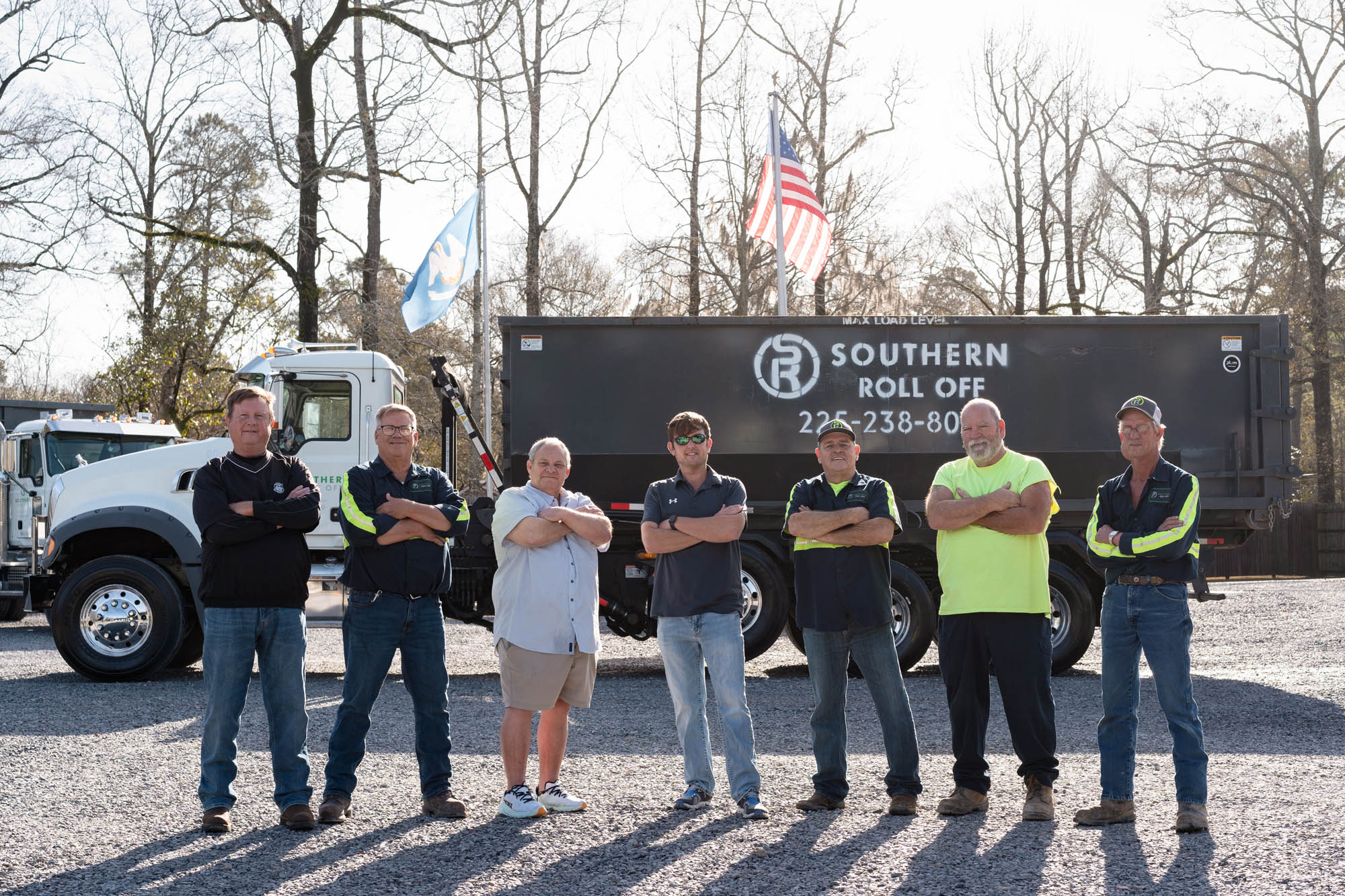 Southern Roll Off team photo with one of their trucks