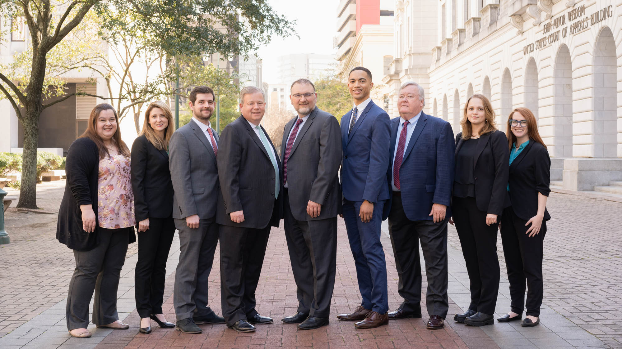 Team of lawyers outside the courthouse in Downtown New Orleans