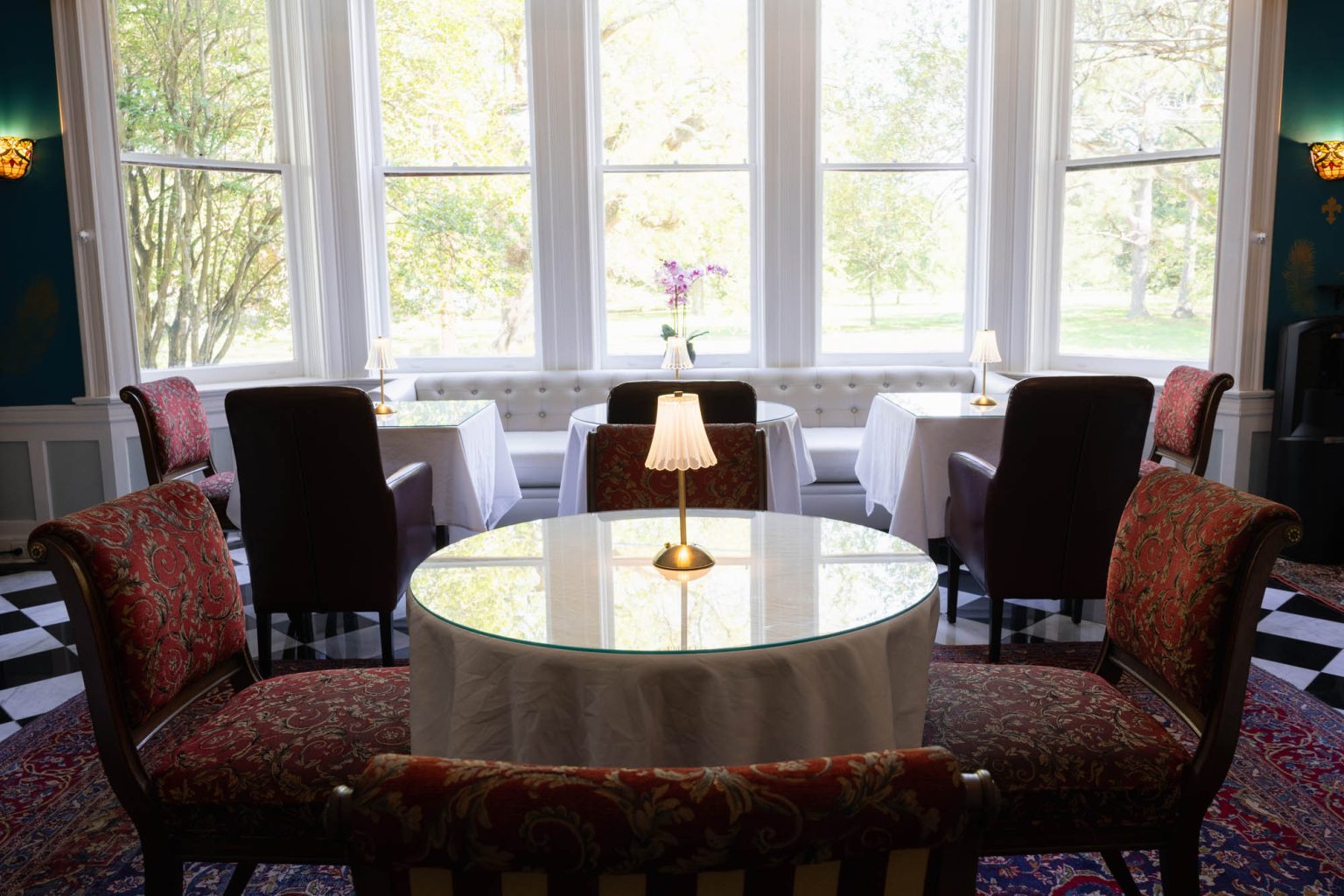 Table and chairs in dining room at hotel