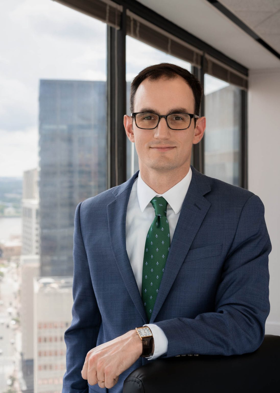 Smiling lawyer in his CBD NOLA office space