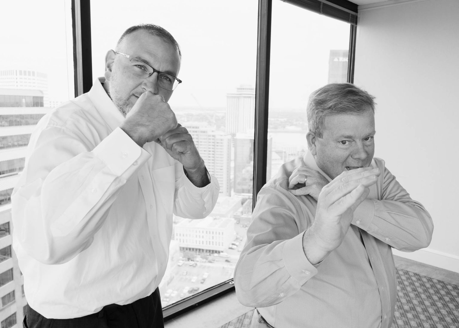 Two lawyers having fun in their Downtown New Orleans office space