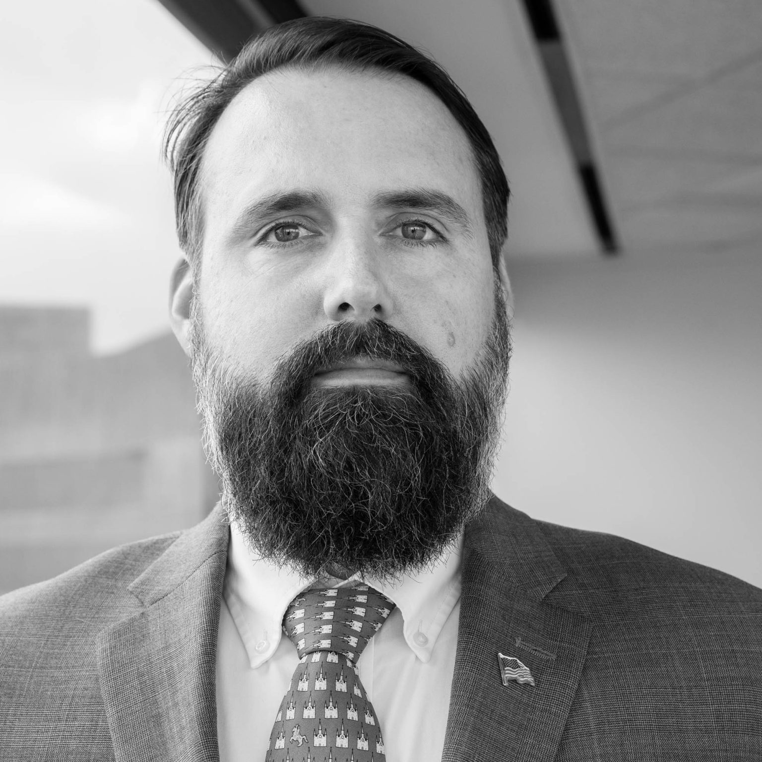 Headshot of attorney in his CBD NOLA office