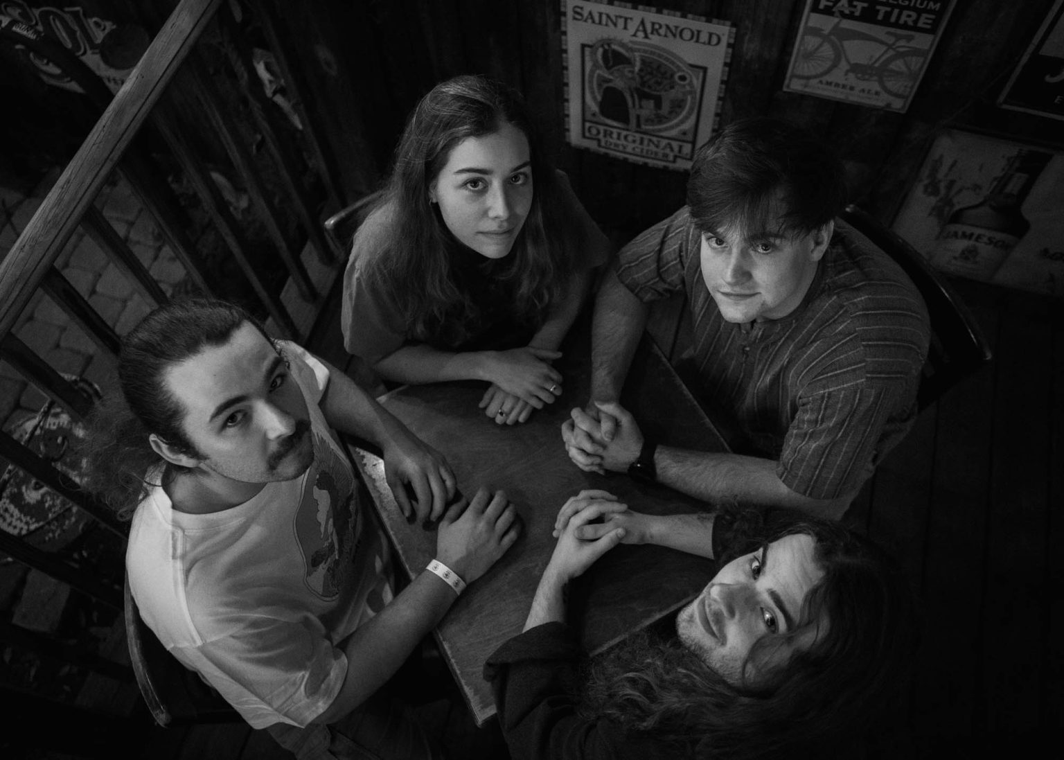 Members of the band Lemon's at a table before their concert