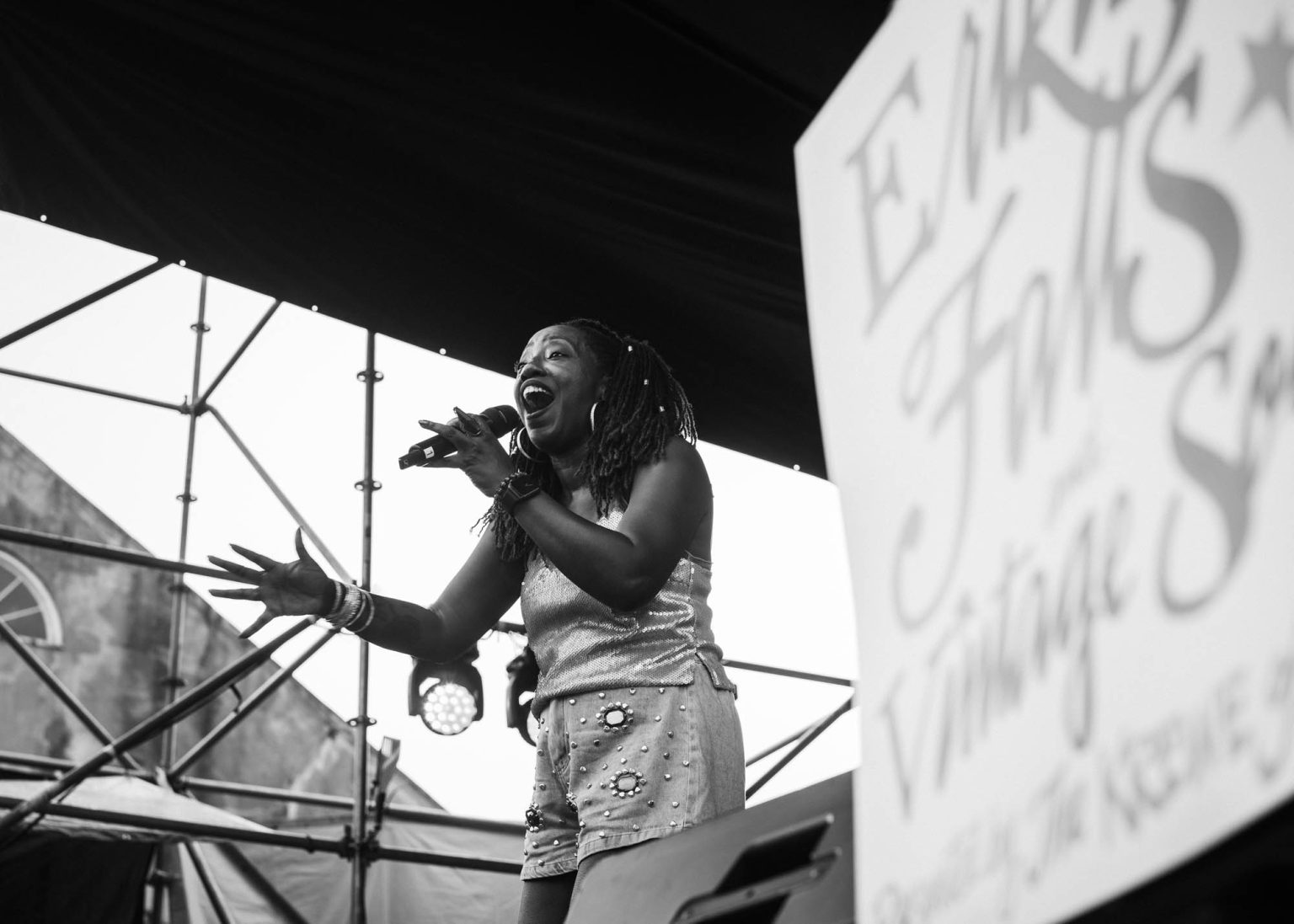 Erica Falls singing on stage at Funk Fest in Nola