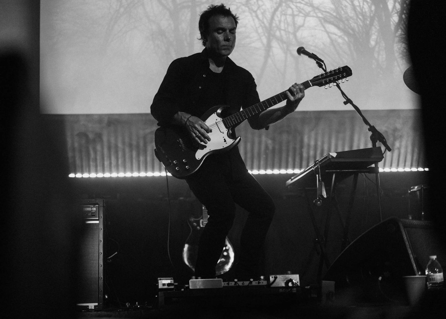 Guitarist dancing while playing guitar at the House of Blues