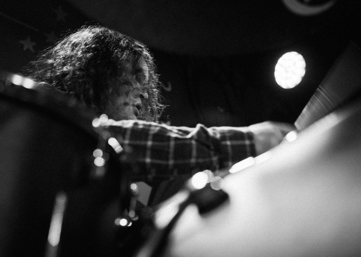 Drummer in the Olivia Barnes Band on stage playing the drums in New Orleans