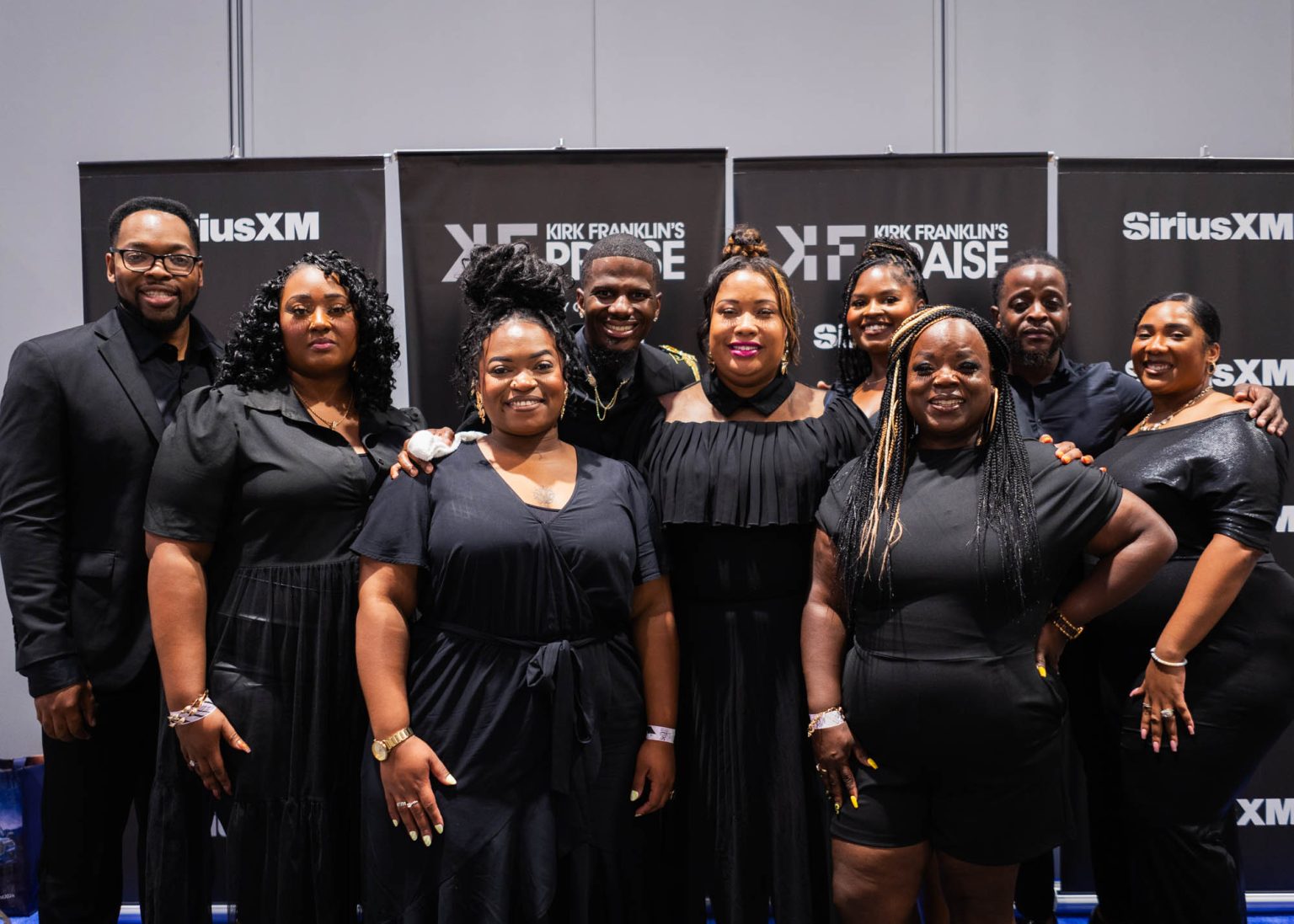 Group of singers back stage after their on stage performance