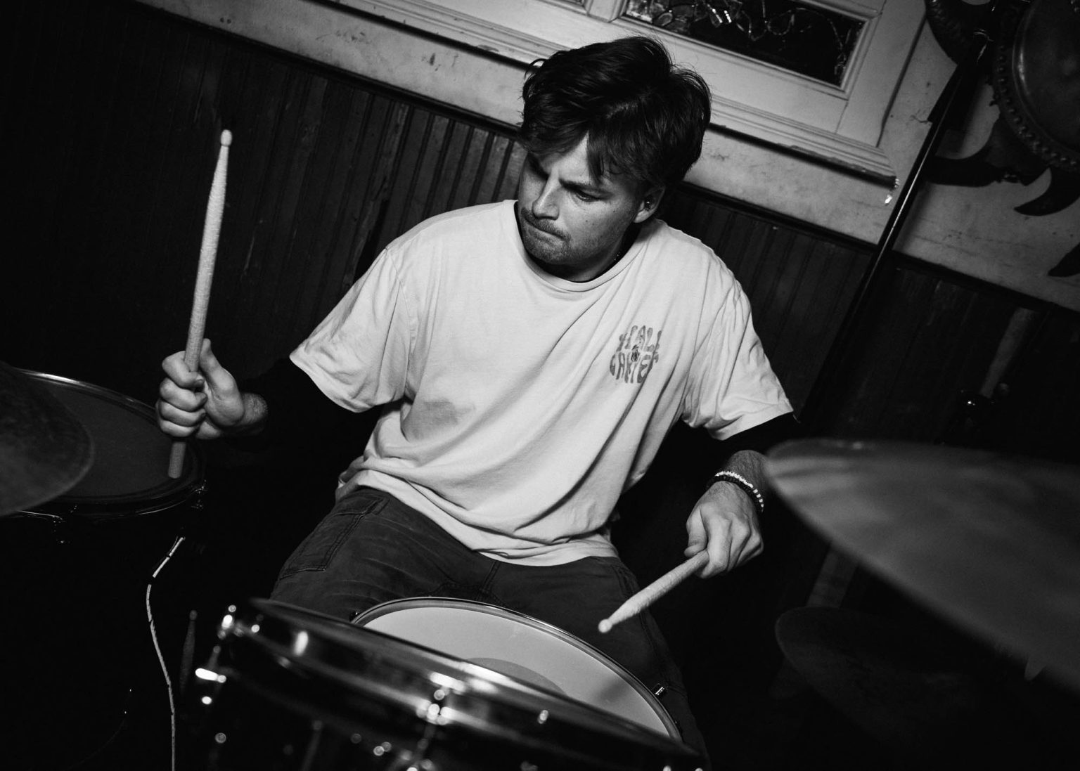 Drummer on stage playing the drums